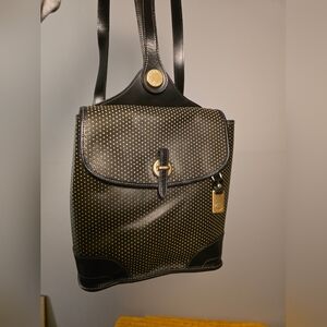 Vintage Y2K Dooney & Bourke Cabriolet black perforated leather backpack